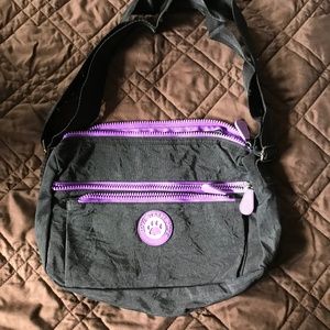 Greater Goods Animal Rescue Site Black Crossbody Bag